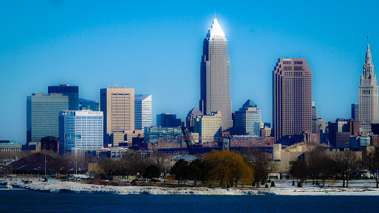 Bright Cleveland Ohio downtown skyline under clear blue sky