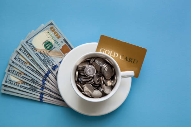 istock one hundred dollar bills and a cup 1438735200