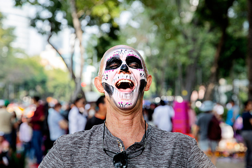 A 60 something man with his face painted, at the annual Day of the Dead parade that takes place every year in late October in Mexico City every year.
Día de los Muertos, or Day of the Dead, is one of Mexico's most recognized holidays. The celebration from Oct. 31 to Nov. 2 commemorates death as an essential element of life and honours loved ones who have passed away.