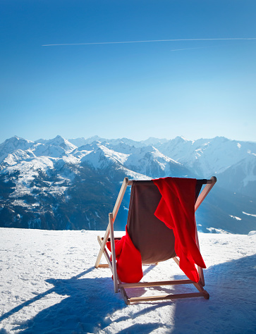 Empty folding chair in the austrian Alps