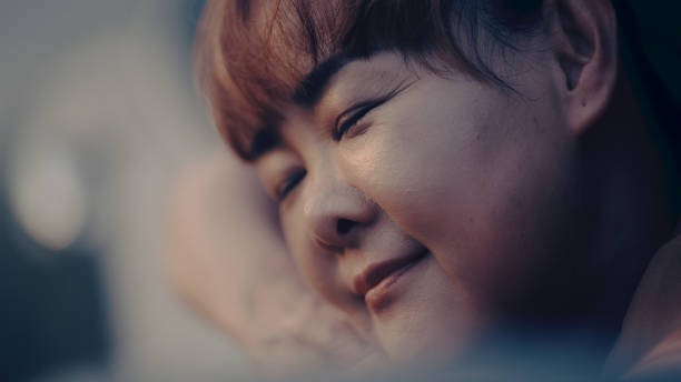 Close-up of a middle-aged woman enjoying the sunset