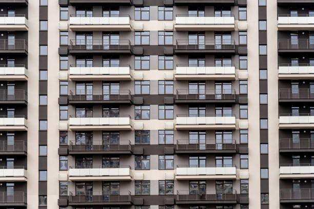 istock modern high-rise residential building close-up full frame 1438742464