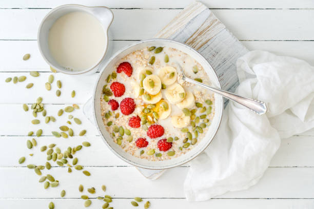istock Banana, quinoa and raspberries in a bowl 1438744477