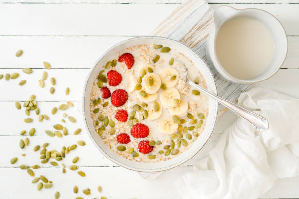 istock Banana, quinoa and raspberries in a bowl 1438744508