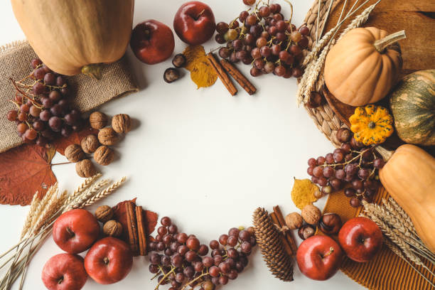 istock Pumpkins and colorful autumn decorations on white background. 1438746385