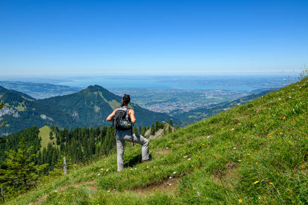istock Young woman hiking in the mountains 1438746713