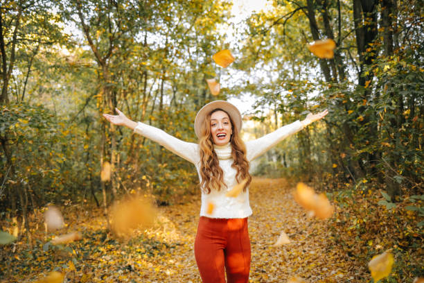 istock Young woman enjoying autumn 1438751139