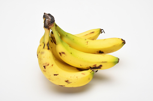Peeled banana, isolated on white background