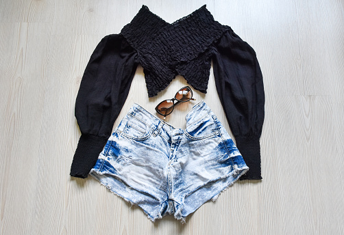 Women's fashion wear, casual clothing shorts, blouse and sunglasses