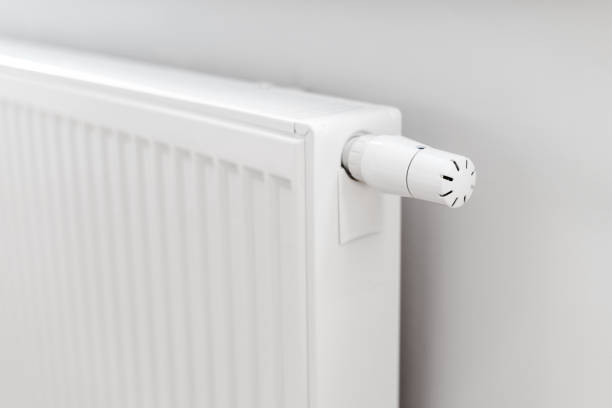 istock Close up shot of regulator knob on new heating radiator 1438757582