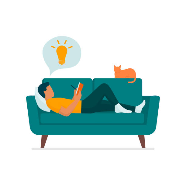 Man lying on the couch and writing Creative man lying on the couch at home, he is reading and writing on a notebook, isolated on white background man writing stock illustrations