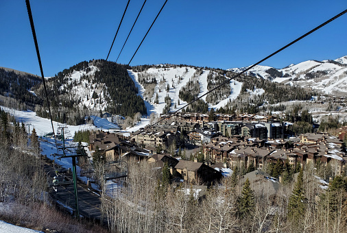 Deer Valley ski resort and lodging seen from above on a ski lift.