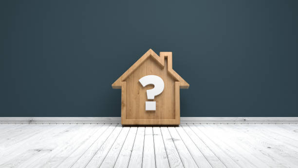Wooden home icon and  question mark stock photo