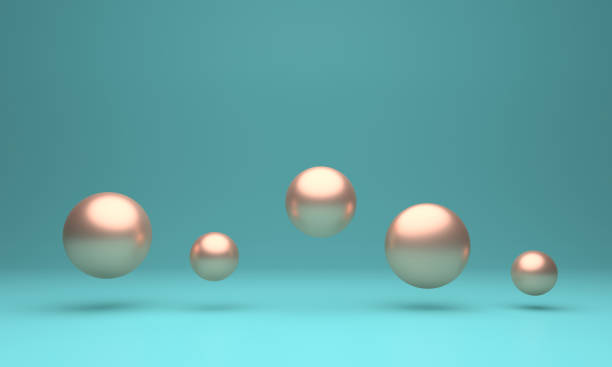 istock Metal spheres mid air 1438770866