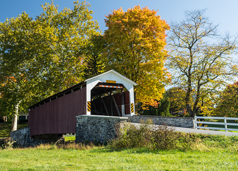 Erbs Covered Bridge in Autumn. This is a beautiful red covered bridge in Lancaster County, Pennsylvania
