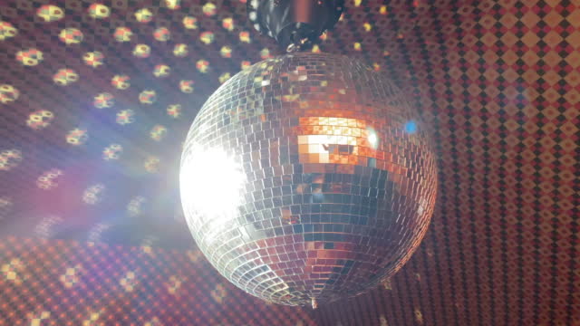 Disco Ball Lit Up In Funky Room