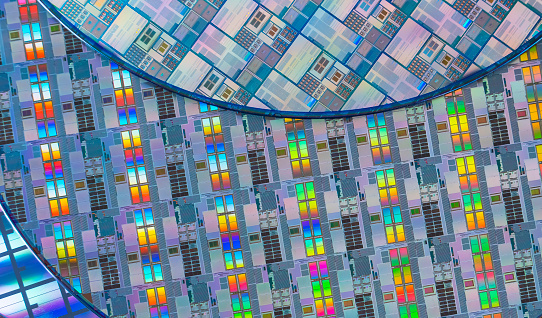 silicon wafer reflecting different colors.