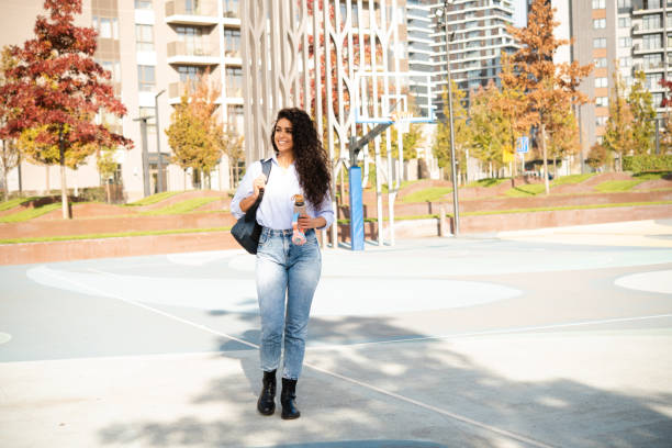 istock Confident young happy woman 1438780178
