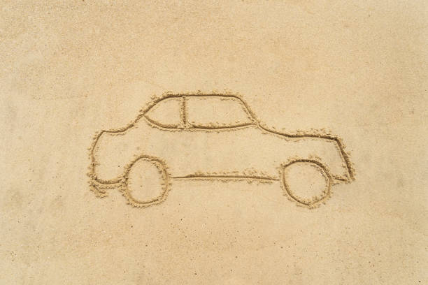 car drawing in the sand