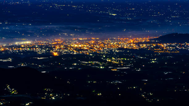 istock Cityscape at night with lights on 1438786753