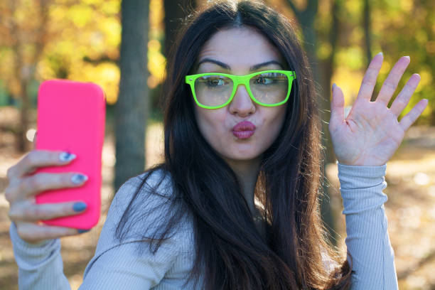 istock Young woman taking a selfie 1438790901