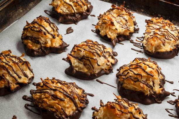 istock Fresh homemade cookies with coconut on baking tray 1438796476