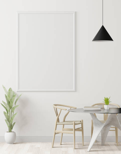 istock Picture frame mounted on the wall with flower vase 1438802531