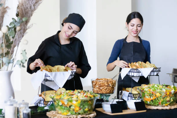 istock Cooks arranging the buffet food 1438803135