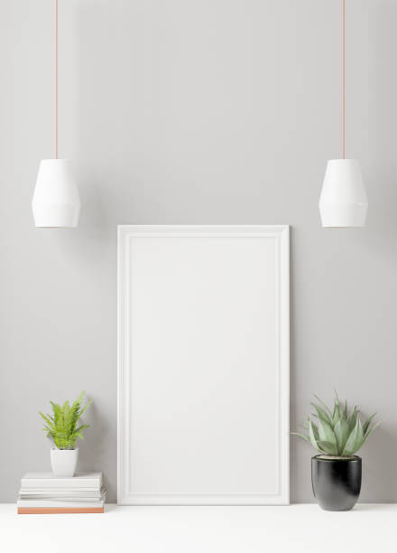 istock A picture frame on the floor with a flower vase. 1438803306