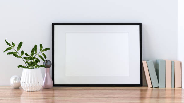 istock A picture frame on the floor with a flower vase. 1438803937