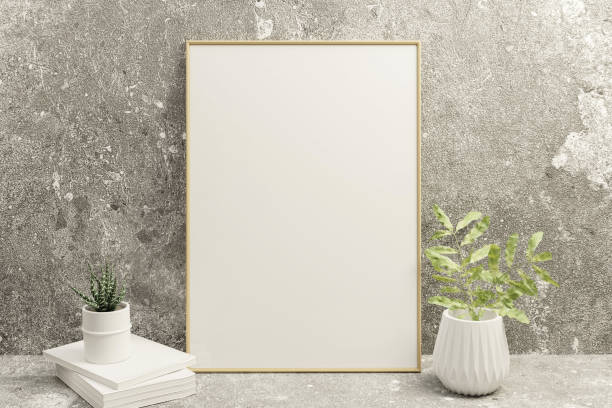 istock A picture frame on the floor with a flower vase. 1438803963