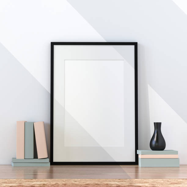 istock A picture frame on the floor with a flower vase. 1438803986