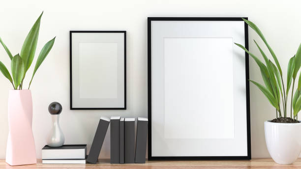 istock A picture frame on the floor with a flower vase. 1438804006
