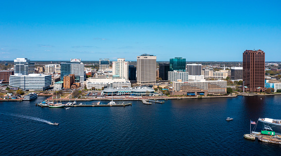 Norfolk Virginia - April 3 2022: Aerial view of Downtown Norfolk from the middle of the Elizbeth River
