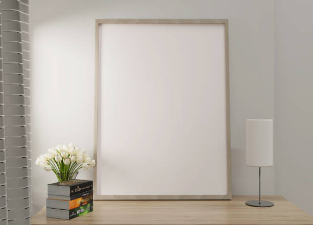 istock A picture frame on the floor with a flower vase. 1438806119