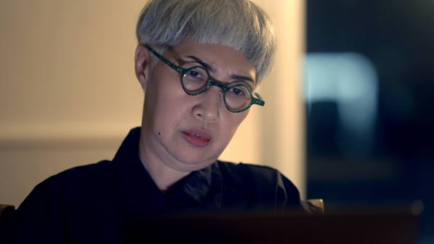 istock woman working overtime in a company 1438812053
