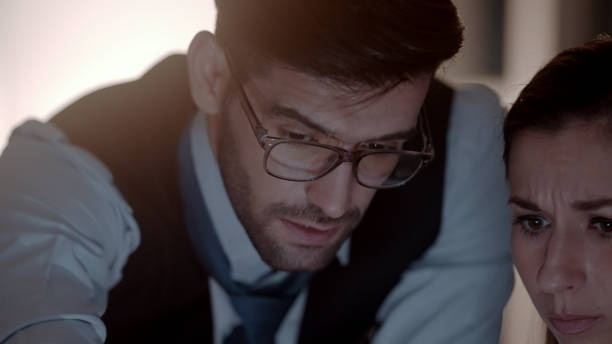 istock Employees working overtime in the company 1438815571