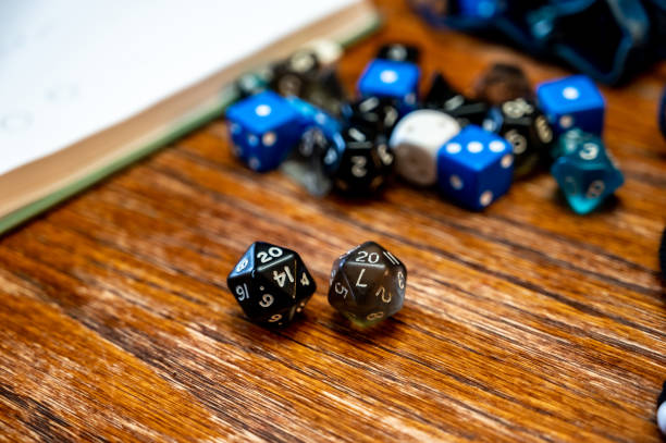 istock Multiple gaming dice on wooden table used for role playing adventures. 1438817410
