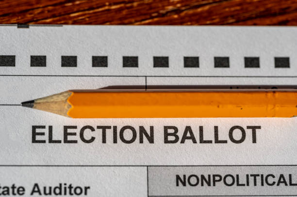 istock Selective focus on a generic election ballot with a pencil on top. 1438817420