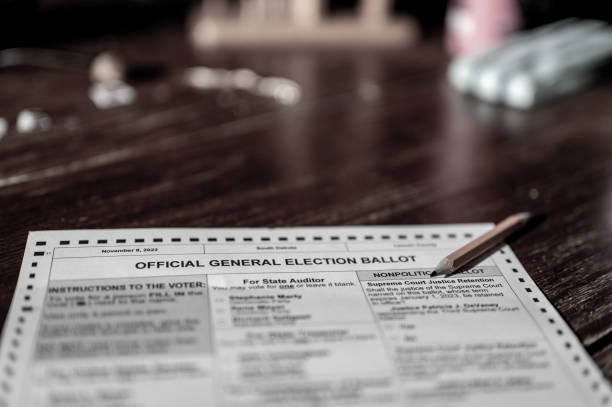 istock Selective focus on a generic election ballot with a pencil on top. 1438817775