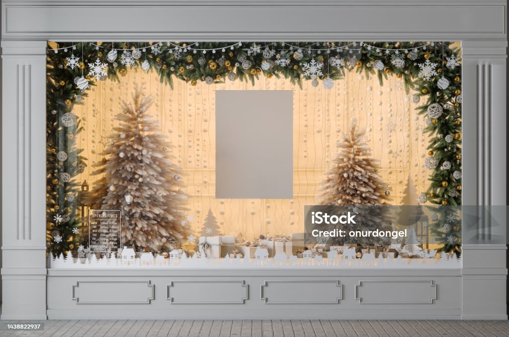 Store Window Display With Christmas Tree, Ornaments, Gift Boxes And Blank Poster Christmas Lights Stock Photo