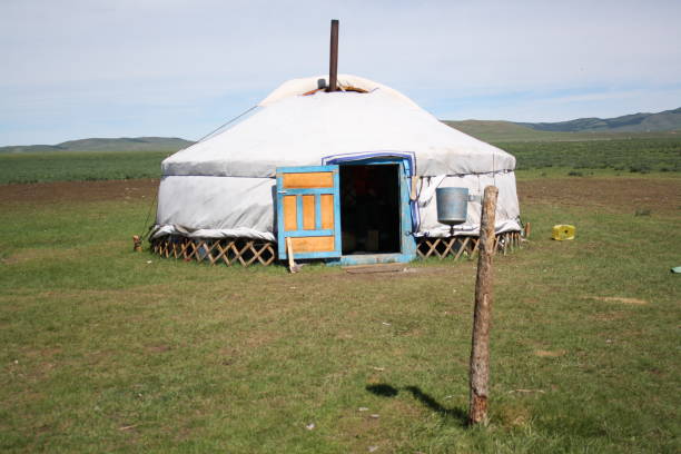 A nomadic tent (ger) and a precious handwashing station in the unknown steppe, Bulgan, Mongolia. stock photo