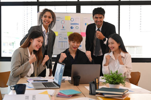 istock Group of start up business people brainstorming, collaborating on project development in corporate office. 1438824460