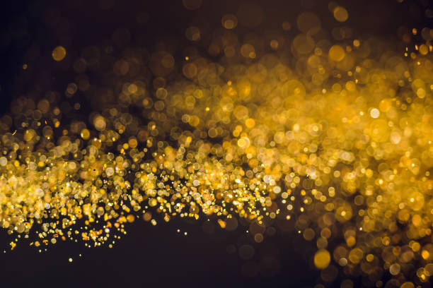 istock Gold glitter abstract festive Christmas light background. 1438835232