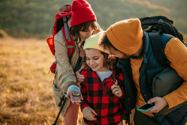 istock Family walking towards camping spot 1438835458