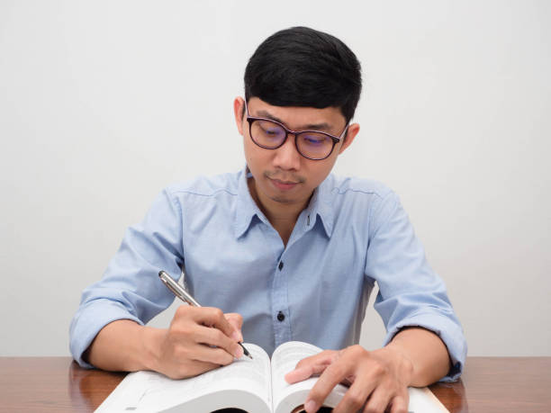 istock Asian businessman sit working at workplace table 1438835918