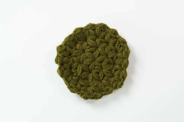 istock cup coaster on a white background. Crochet stand for hot. 1438835975