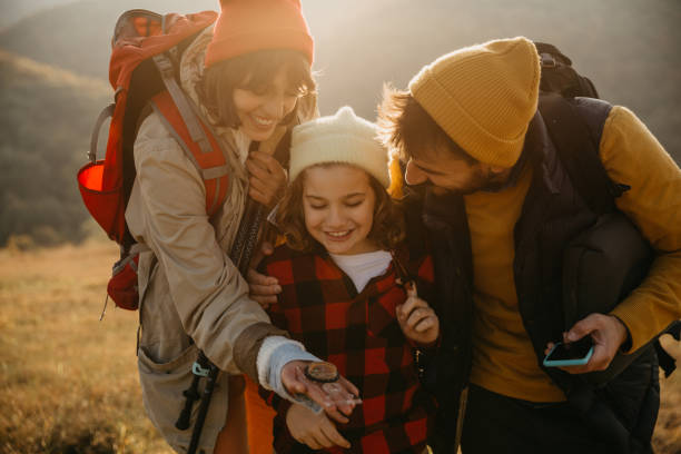 Family walking towards camping spot
