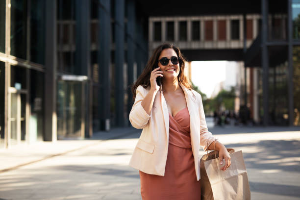 istock Happy woman using the phone 1438837105