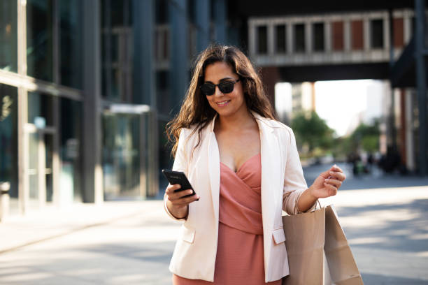 istock Happy woman using the phone 1438837181